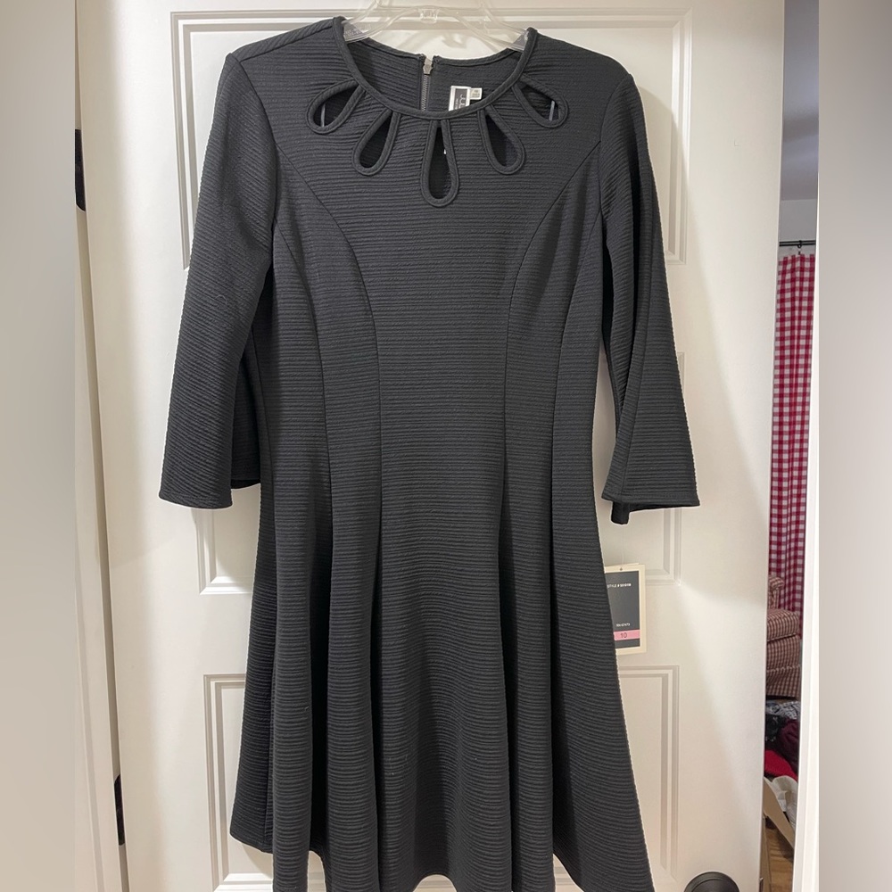 Dress with 3/4 sleeve  size 10, Black with front cutout, fit and flare